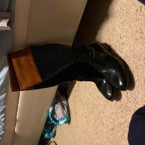 Black and brown horse riding boots